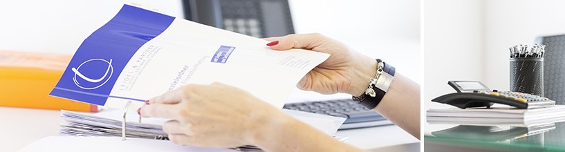 A woman storing files of Leidel in a folder 